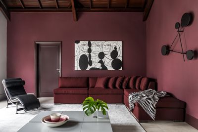 How high should you hang art above furniture? The magic number designers use for gauging picture perfect walls