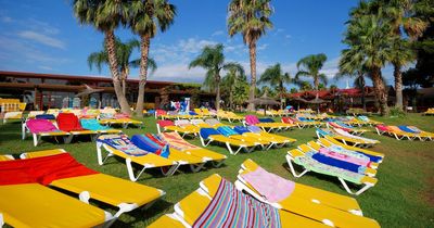 Sunbed wars begin as frantic tourists battle to reserve pool loungers before 8am