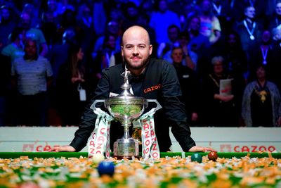 Luca Brecel finds winning formula to become party-loving champion of the world