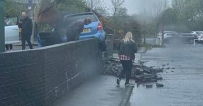 'Upset' elderly driver smashes through wall of Aldi car park as shoppers watch in horror