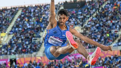 Chinese athletes closely studying Indian long jumpers