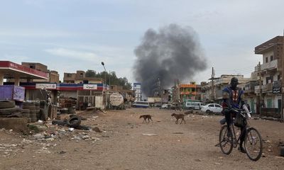 ‘One of you has to have a gun’: Khartoum residents band together for protection