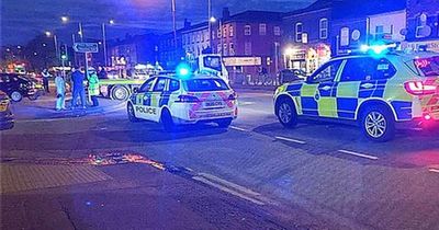 Driver crashes car through wall outside Liverpool police station