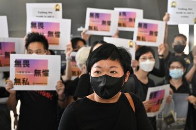 Hong Kong court considers journalist appeal on press freedom day