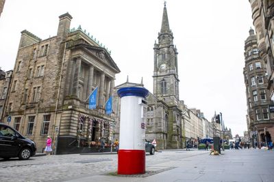 Red, white and blue coronation postbox appears in Edinburgh