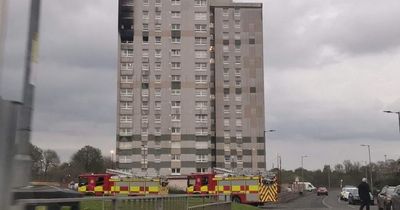 Fire fighters remain on scene after 12th floor blaze at tower block