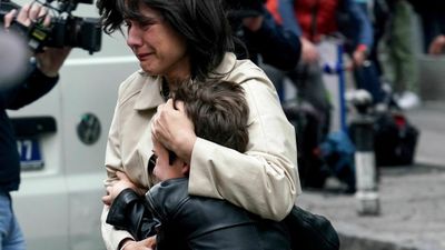 A student and his father are detained after 9 die in school shooting in Serbia
