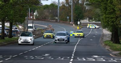 Woman hit by white Fiat 500 as police close Queens Drive