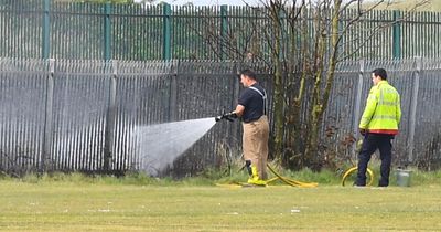 Trains suspended as firefighters hose down lines after 'power surge'