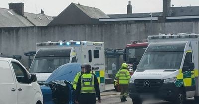 Woman rushed to Scots hospital 'after being cut from car' following crash