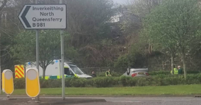 'Runaway' car flips onto roof after 'plunging down embankment' in Scots village