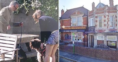 Boy, 7, mauled by dog in pub garden as police release photo of couple who left scene