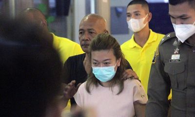 Thai woman suspected of cyanide poisonings is charged with 14 murders