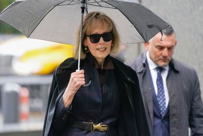 Trump calls accuser a 'nut job' in recording played for jury