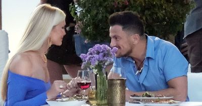 Peter Andre holds hands with Caprice during cosy lunch after jetting off to Ibiza