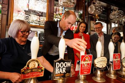 Prince William pours a pint, meets public before coronation