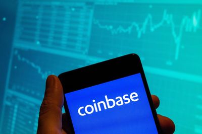 Coinbase stock jumps 8% after the crypto exchange reports smaller than expected loss and an increase in subscription revenue