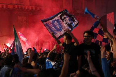 Napoli’s fans light up the sky as they celebrate Serie A title win