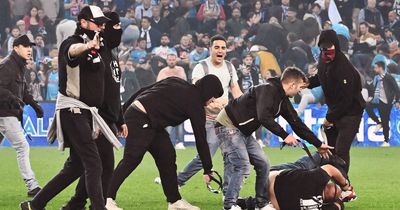 Napoli fan shot dead during Serie A title celebrations as hooligans fight on pitch with belts