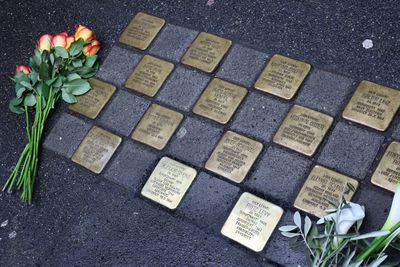 German artist nearing 100,000 cobblestones to mark victims of Nazis