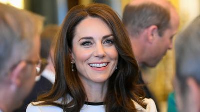 Princess Catherine steps up her coronation style game in monochrome midi dress and chic $795 bow heels - and we can't get over her bouncy blow dry