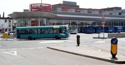 Audi driver follows BMW before ramming it at busy bus station