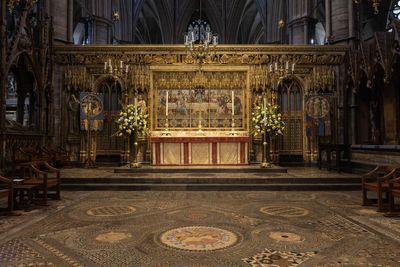 Stage set with coronation theatre inside Westminster Abbey