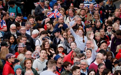 The Latest: Crowds grow outside palace for king's coronation