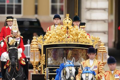 King and Queen begin coronation day with procession to Westminster Abbey