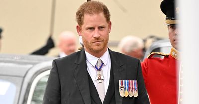 Prince Harry spotted for first time as he arrives alone for father's Coronation