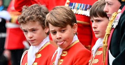 Prince George's starring role with page boys as future king watches Charles be crowned