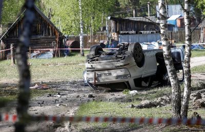Russia blames Ukraine, U.S. for car bomb that wounded writer