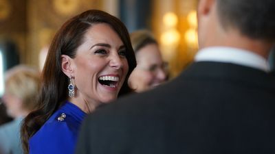 Princess Catherine sparkles in sapphires with royal blue wrap dress as she nails Hollywood waves at Buckingham Palace