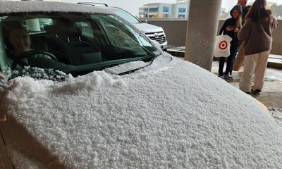 ‘First proper day of winter’: snow and hail blanket parts of NSW and ACT as cold front settles across south-east