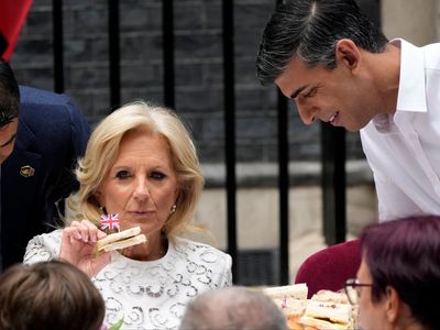 Jill Biden appears to inspect cheese and pickle sandwich at coronation lunch with Rishi Sunak