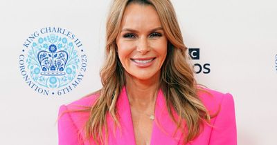 Amanda Holden sizzles in hot pink suit with glimpse of matching bra as celebs arrive for Coronation Concert