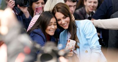 Kate Middleton grabbed by HAIR by over enthusiastic American fan leaning in for selfie