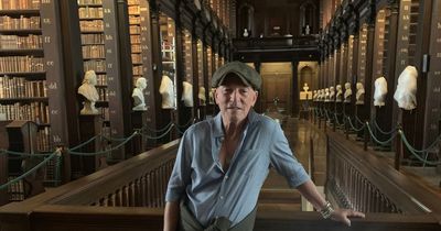 Bruce Springsteen enjoys a browse through Trinity College's famous library