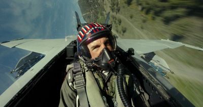 Tom Cruise accepts MTV Movie Award for Top Gun while flying in vintage fighter plane