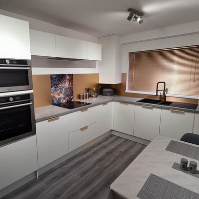 DIYer saved £1000s giving a dated kitchen a slick ultra-modern transformation