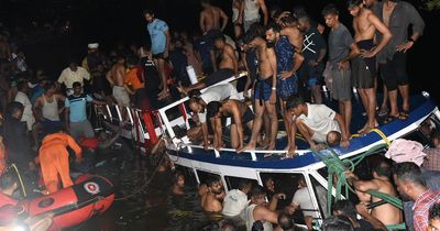 Tourist boat capsizes near beach with more than 20 dead - including seven children