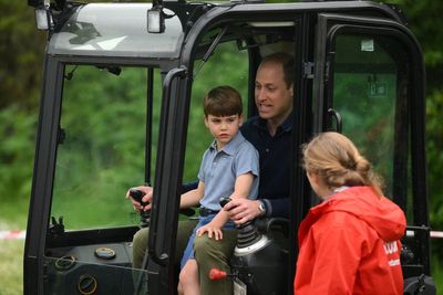 Prince Louis digs in with family at Big Help Out event renovating scout hut