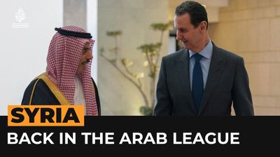 How has the world reacted to Syria rejoining the Arab League?
