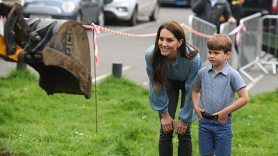 Kate Middleton nails casual chic as she volunteers in Slough in a delicate blue blouse and black skinny jeans