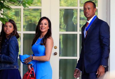 Tiger Woods' lawyers try to stop ex-girlfriend's lawsuit