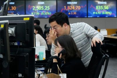 Stock market today: Asia shares trade mixed ahead of reports