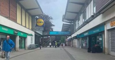 Locals refuse to abandon shopping centre blasted as scene from a 'zombie apocalypse'