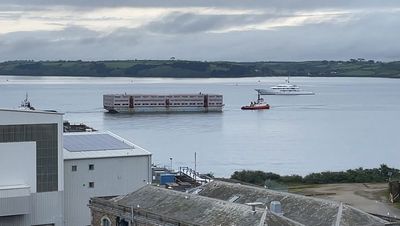 Bibby Stockholm: Mega-barge for 500 asylum seekers arrives in Falmouth ‘amid right-wing protest fears’