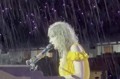 Taylor Swift performs in the pouring rain in her final Nashville show