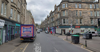 Major Edinburgh road closed as two men rushed to hospital after car struck pedestrian